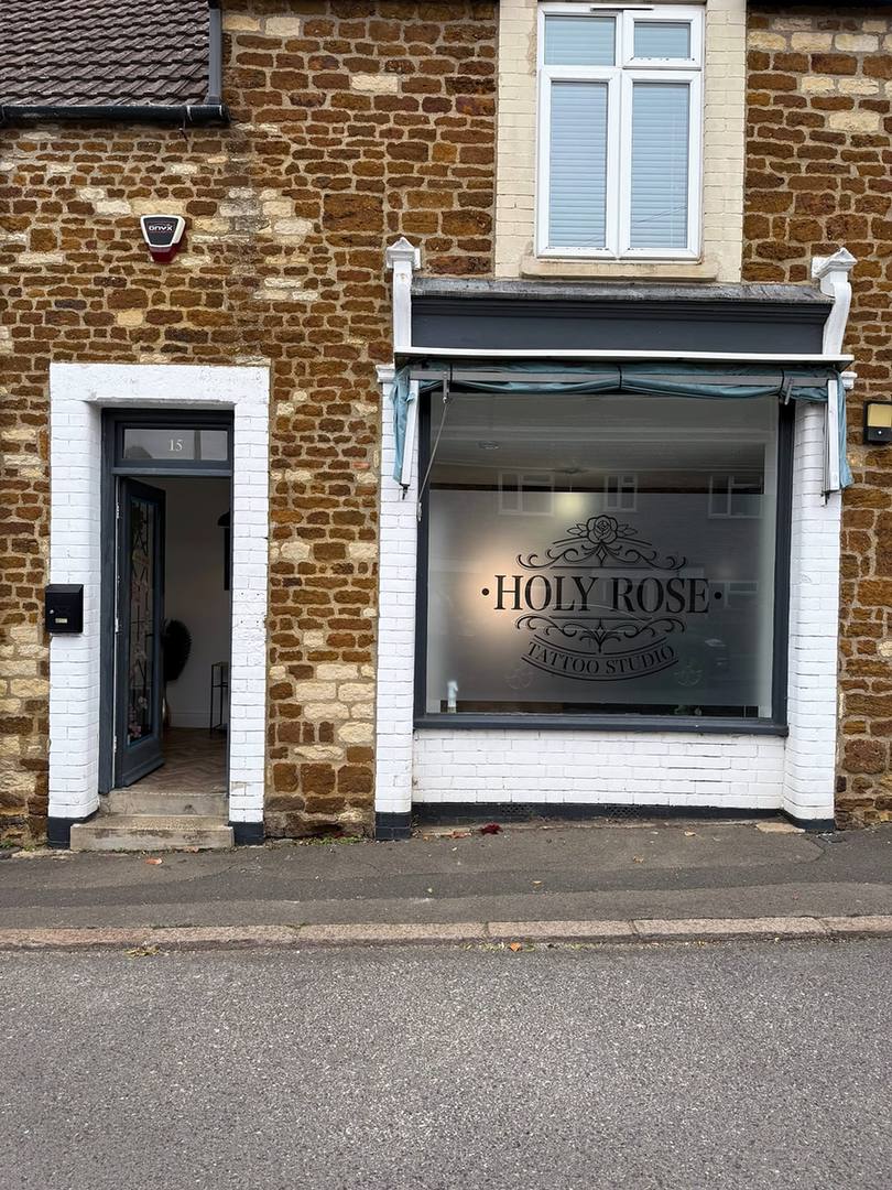 The studio's front on the street, with Holy Rose on the window